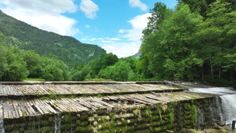 natural waterfalls landscape in logar valley slovenia, savinja river green hills and natural countryside peaceful atmosphere