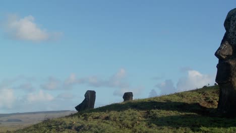 pan to side view of giant stone carving on easter island