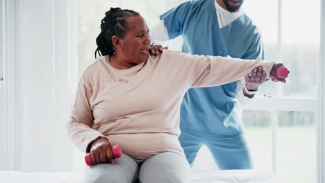 Physiotherapy,-arm-and-dumbbell-with-a-black-woman