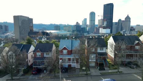 houses in downtown pittsburgh with city skyline in background