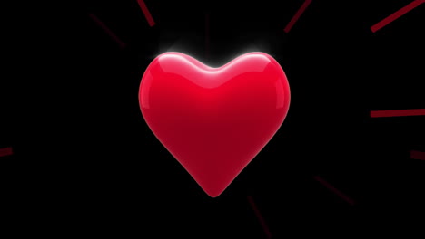 animación del icono del corazón con rayos pulsantes rojos sobre fondo negro