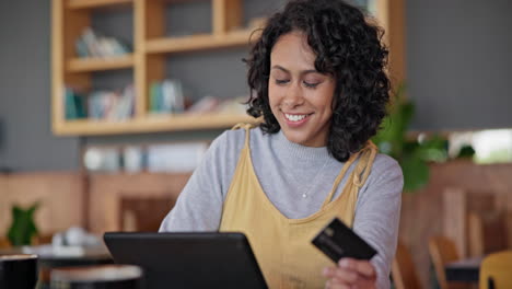 Tablet,-credit-card-and-woman-in-coffee-shop