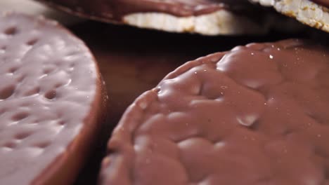 heap of crunchy chocolate rice crispbreads. macro