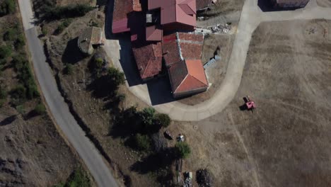 Long,-slow-aerial-shot-of-the-roads-of-small-village-on-the-rural-side-of-Zamora,-Castilla-y-León,-España