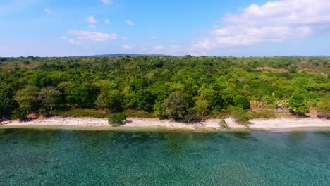 Dramatic-pullout-shot-of-Moyo-island-beach-and-nature-reserve-Indonesia