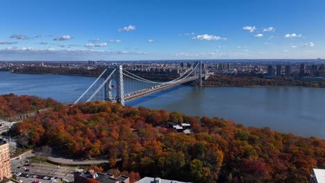 an aerial view high over fort lee, new jersey on a sunny day in autumn