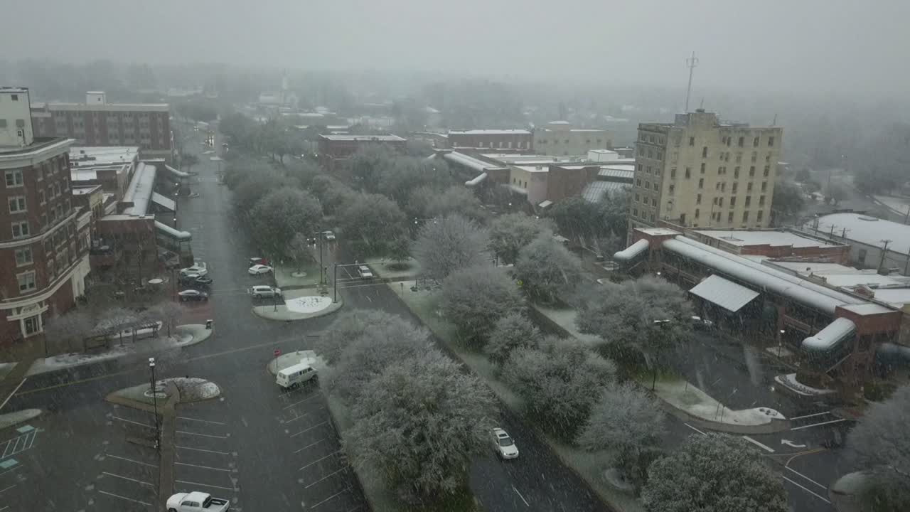 Aerial View of Small town Main Street During a Snowstorm