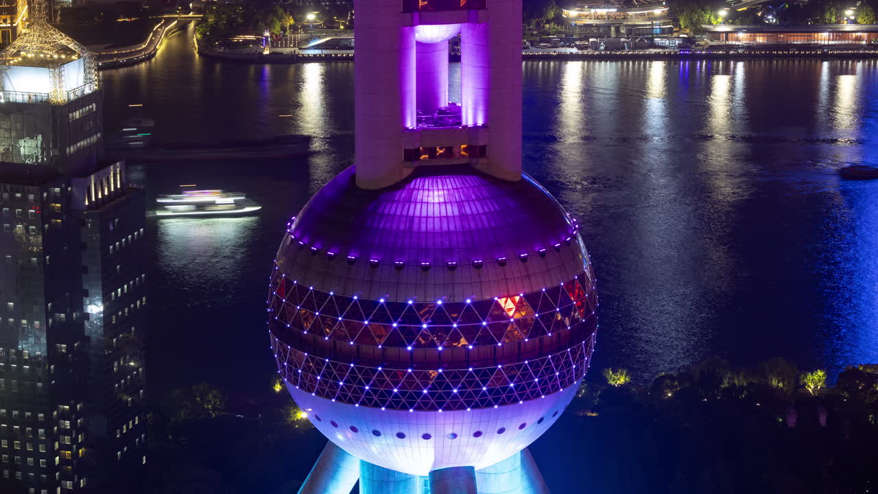 SHANGHAI, CHINA - 11 JUNE 2025 : Timelapse of the Shanghai city skyline from a high vantage point at night