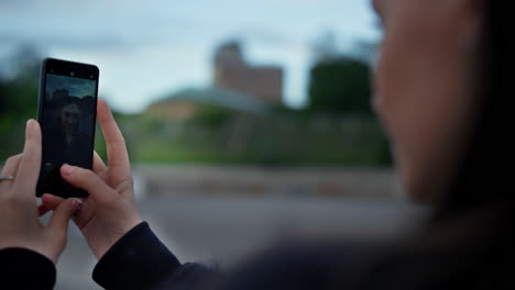 woman hands using mobile phone