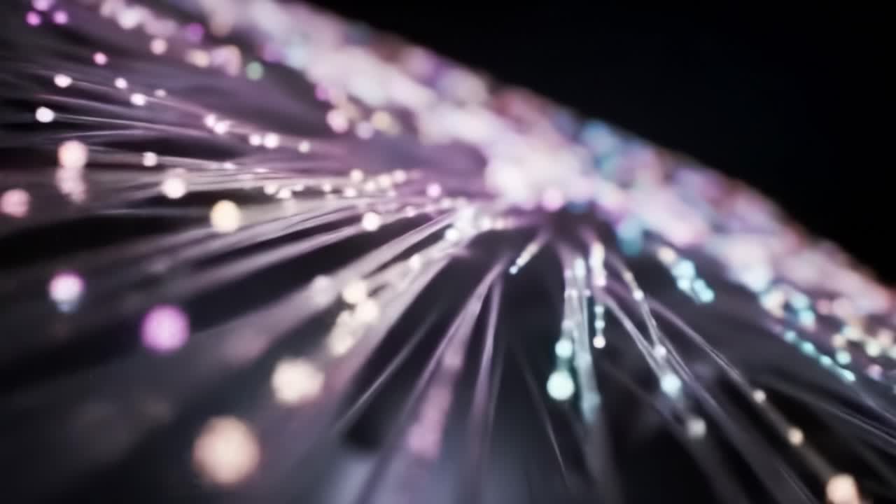 Intricate strands illuminated in vibrant colors create a stunning light display that captivates viewers. This artistic arrangement embodies creativity and innovation, blending technology with beauty.