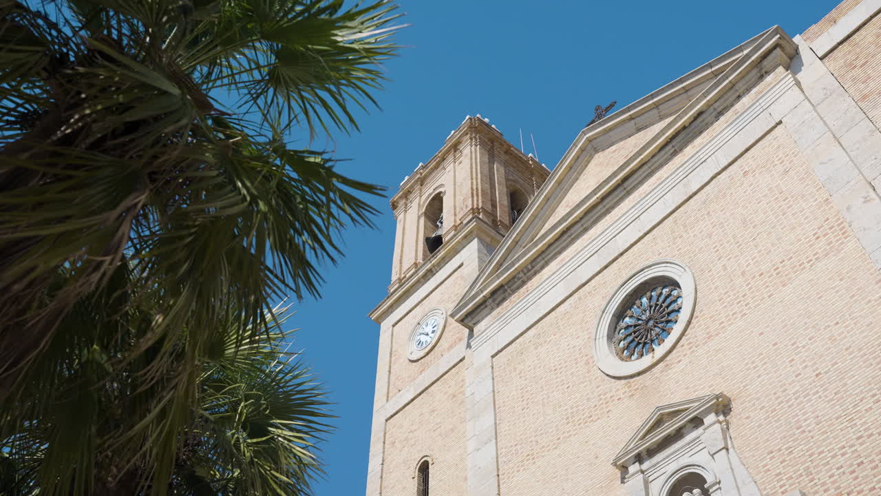 Facade of a Church with Palm Trees