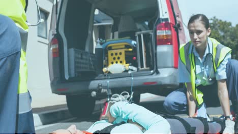 animation of diverse paramedics with patient and ambulance