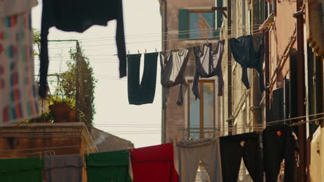 laundry drying in a venetian alleyway