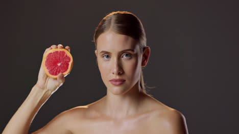 woman with grapefruit