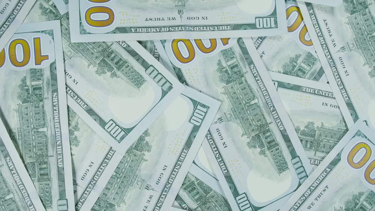 o dólar na mesa giratória. o dólar girar girar. torcer, fazer o design de forma círculo