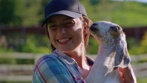 woman with baby goat