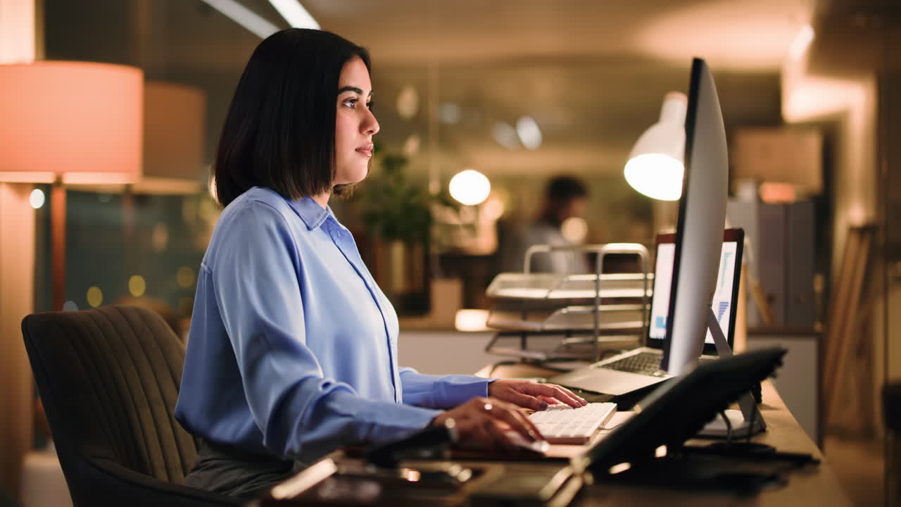 Woman working late at the office