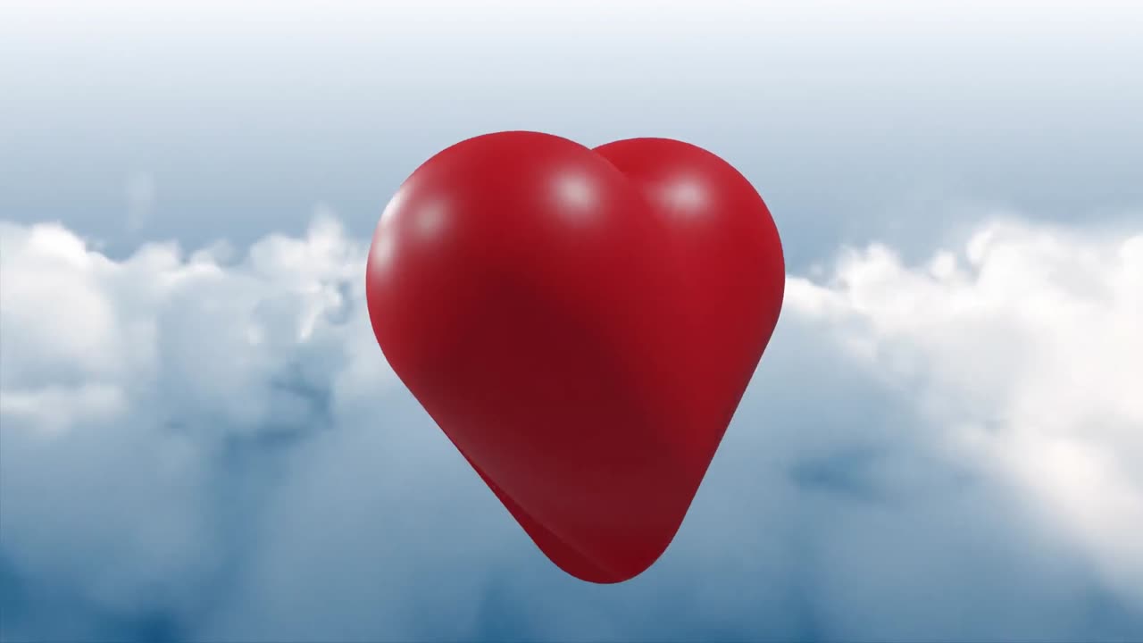 animación de corazón rojo sobre el cielo con nubes.