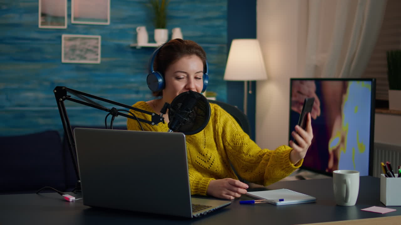 Influencer using phone for taking selfie recording podcast
