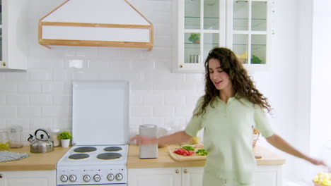 woman dancing in the kitchen