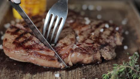 slicing a delicious steak