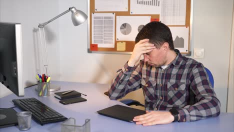 stressed employee in office