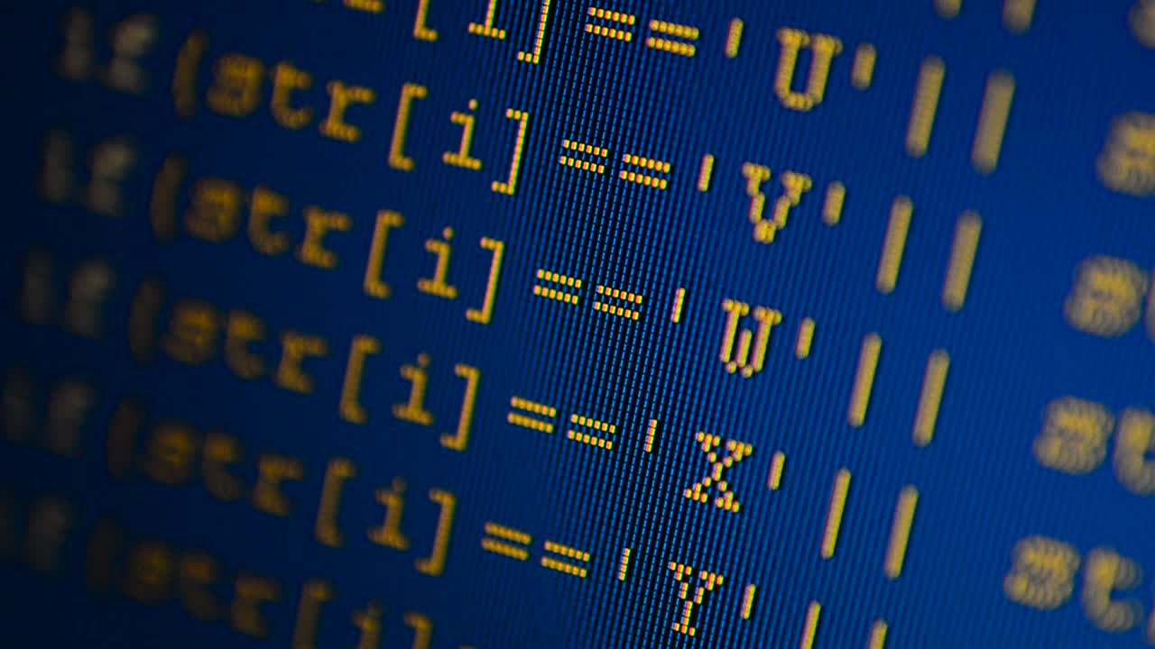 Source code on the monitor screen. Source code