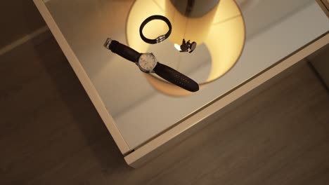 men's accessories: watch, bracelet, and cufflinks