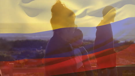 animación de la bandera de colombia sobre la familia caucásica
