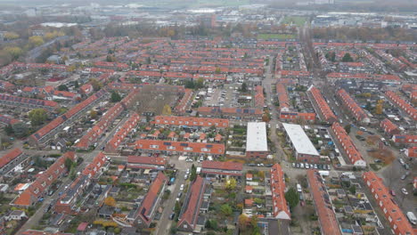 Flying-over-a-colorful-suburban-neighborhood-in-autumn