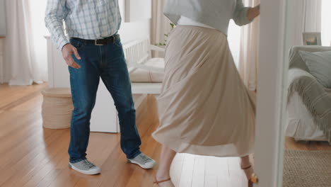 happy-mature-couple-dancing-at-home-enjoying-romantic-dance-together-celebrating-relationship-milestone-having-peaceful-retirement-4k