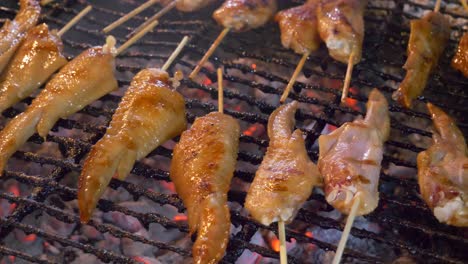 Grilled-bbq-charcoal-roast-chicken-wing-night-market-street-food-booth-cooking