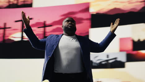 african american guy shows gratitude standing with hands in prayer sign