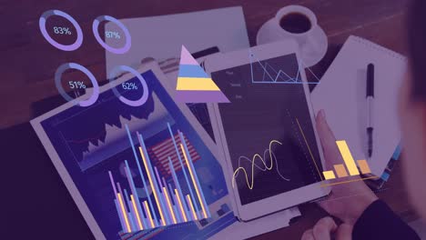 animation of statistics and financial data processing over caucasian woman using tablet
