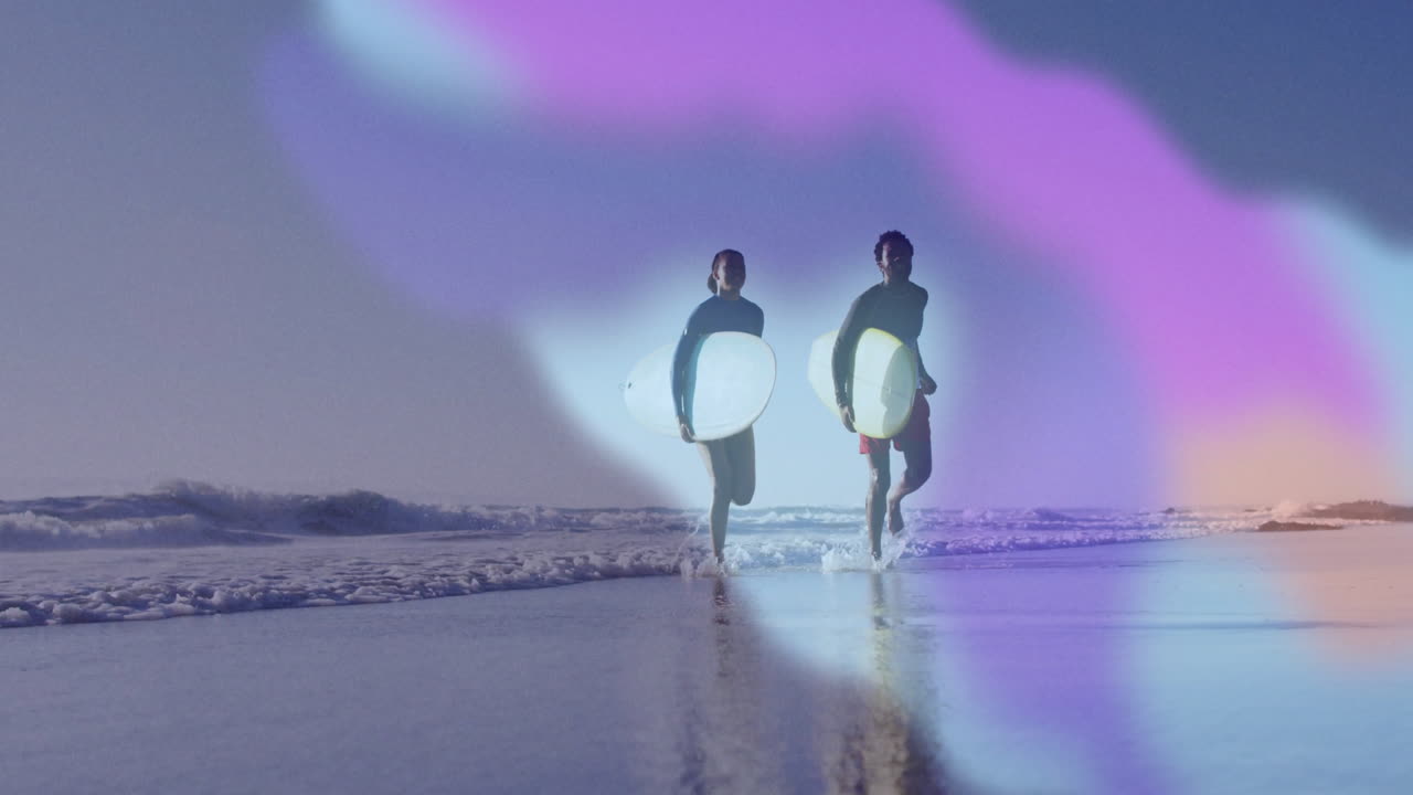 man and woman running with surfboards on beach for travel ad, with animated purple-pink light flare