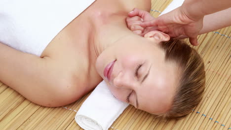 woman enjoying a head massage