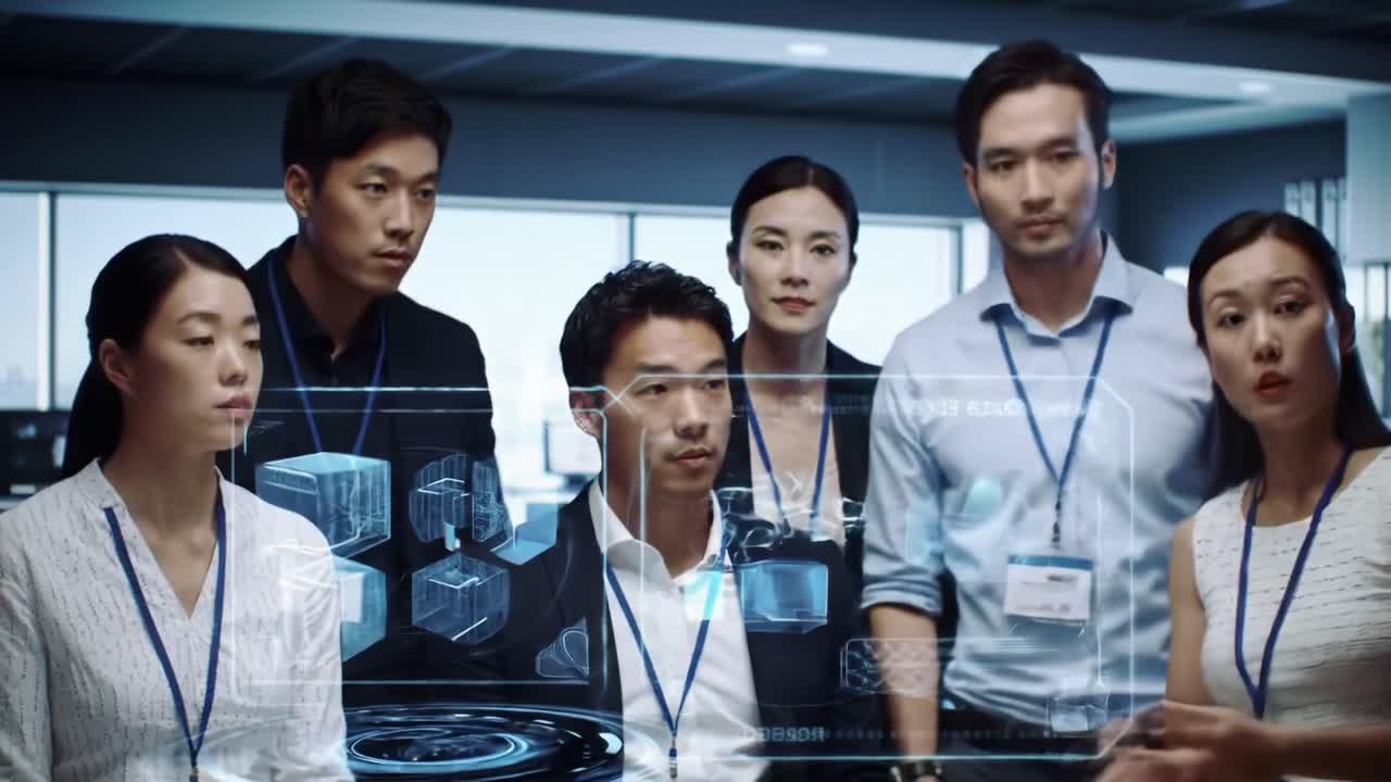 A group of diverse professionals engaged in a modern technology discussion, analyzing digital data visualizations in a high-tech conference room setting