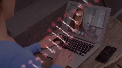 animation of dna strand spinning over woman on laptop video call