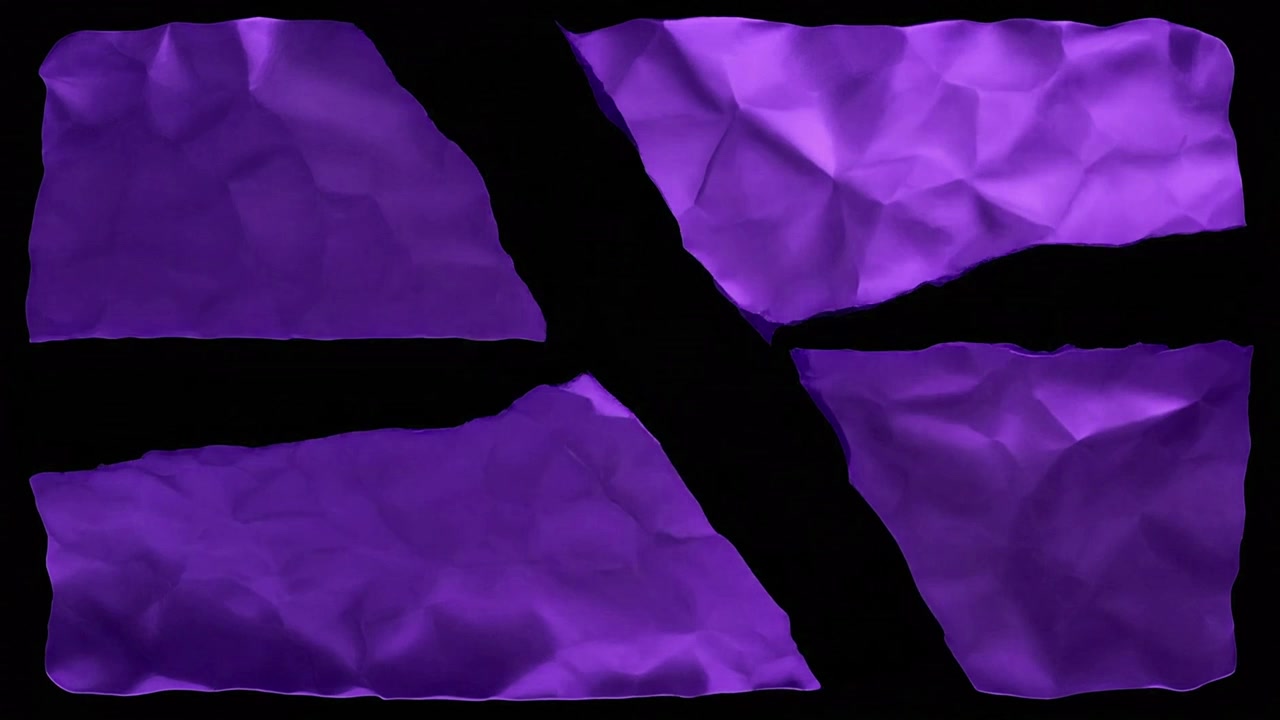 Foglio di carta viola accartocciato che si strappa in quattro pezzi