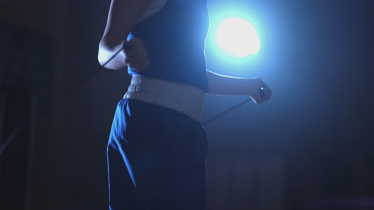 Close-up of the boxer's hand in time jumping rope