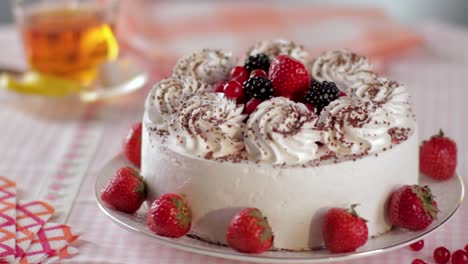 delicious fruit cake with whipped cream