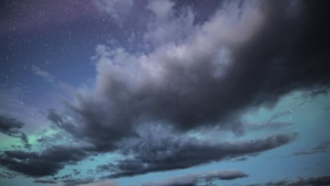 a beautiful dance of the northern lights in the stormy night sky