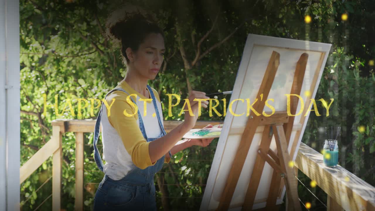 イーゼルで絵を描く画家。手の近くで金色の火花が舞い、そこから「HAPPY ST. PATRICK'S DAY」のメッセージが現れる。