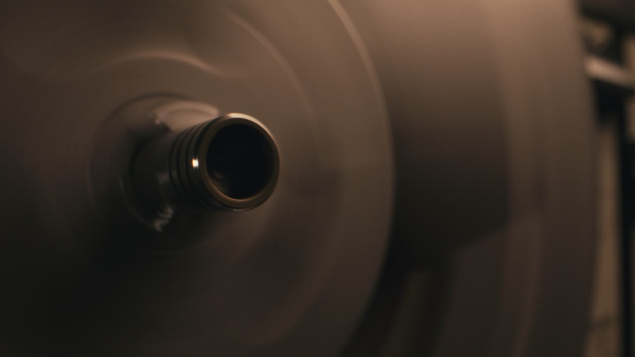 A vintage tape recorder in a pulsing light