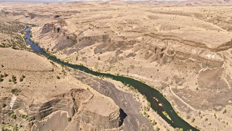 deschutes river oregon aerial v69 birds eye view drone flyover frog springs canyon and river capturing high desert barren landscape with mt jefferson in summer - shot with mavic 3 cine - august 2022