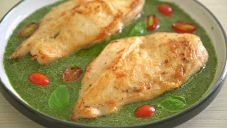 grilled chicken steak with pesto sauce and tomatoes