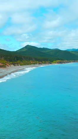 coastal scenery with mountains and turquoise water