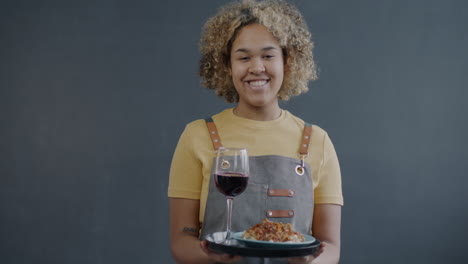 woman waitress serving food and wine