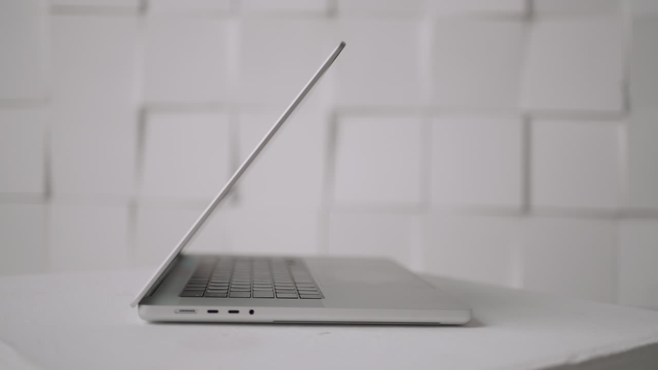 Silver Laptop on White Table