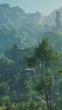 misty mountain valley with ancient ruins